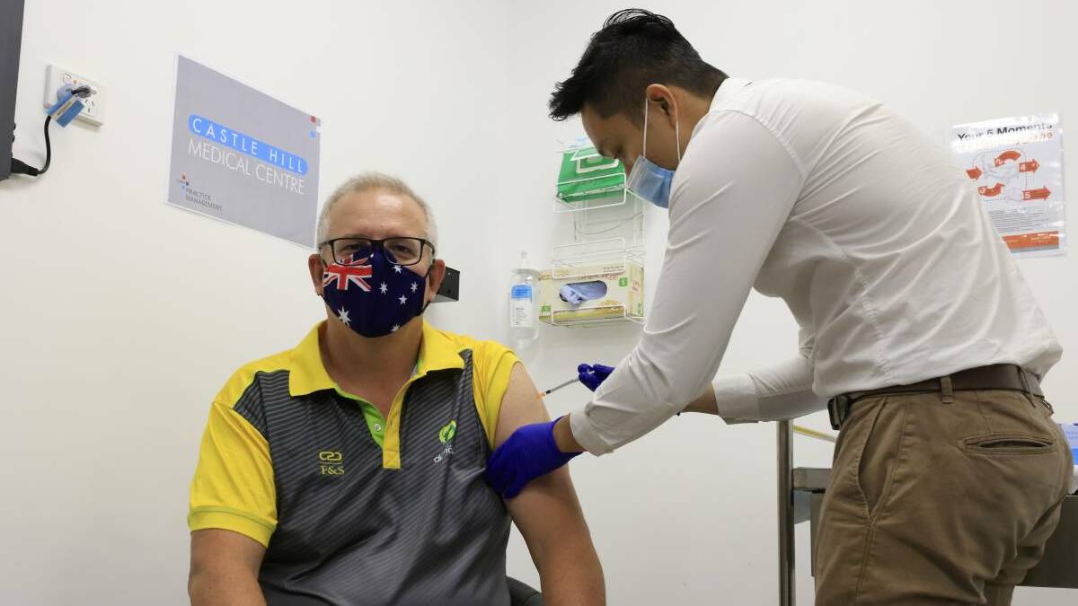 Prime Minister Scott Morrison receives a COVID-19 vaccination at Castle Hill Medical Centre in late February. Photo: Getty Images
