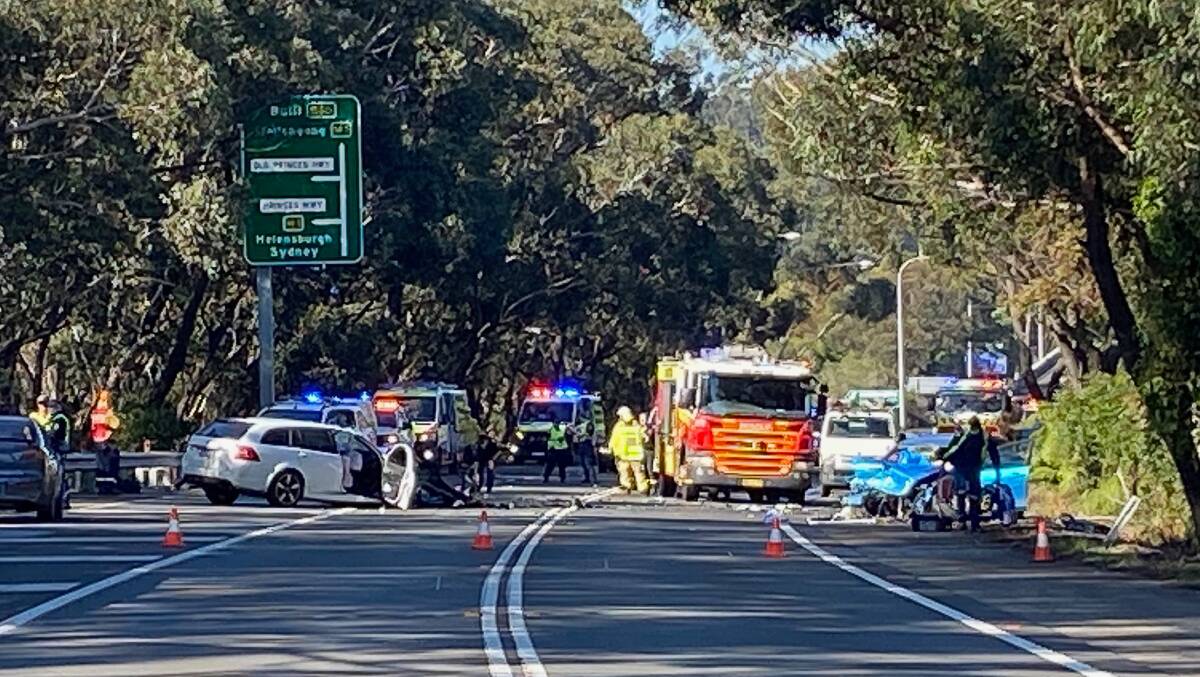 Emergency services at the scene of the crash on Appin Road.