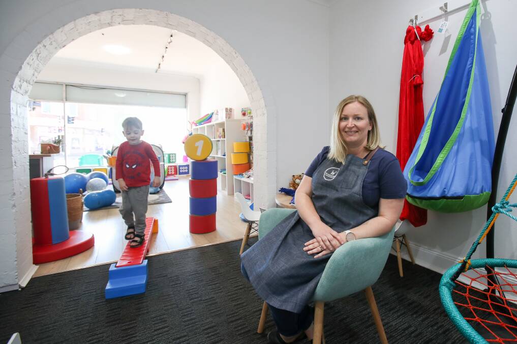 Erin Jamieson, pictured with Rory Smallman, 3, in her new shop in Fairy Meadow. Photos: Adam McLean