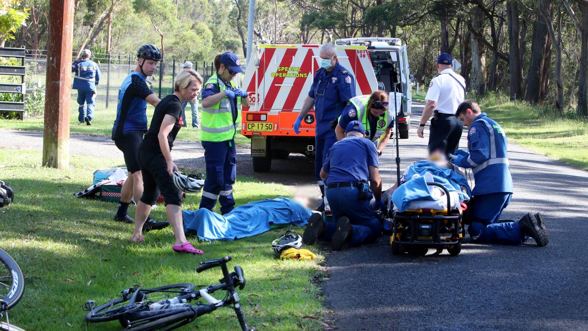 A NSW Ambulance spokesman said a 60-year-old male and 60-year-old female were involved in the accident at Darkes Forest Road. Photos: Sylvia Liber 