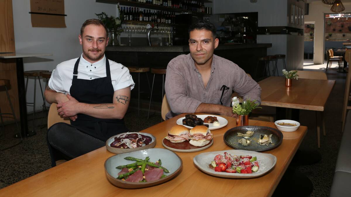 Jimi Butcher and Erick Zevallos with some of the new international flavoured food from the new kitchen at The Throsby in Kembla Street, Wollongong. Photo: Greg Ellis.
