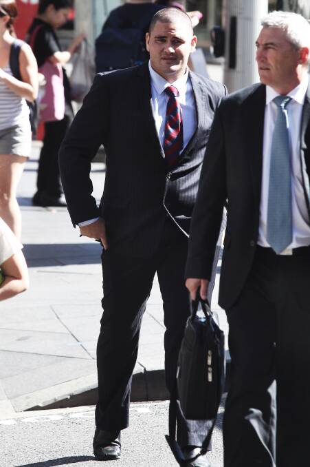Newcastle Knights player Russell Packer arrives at Downing Centre district courts in 2014.