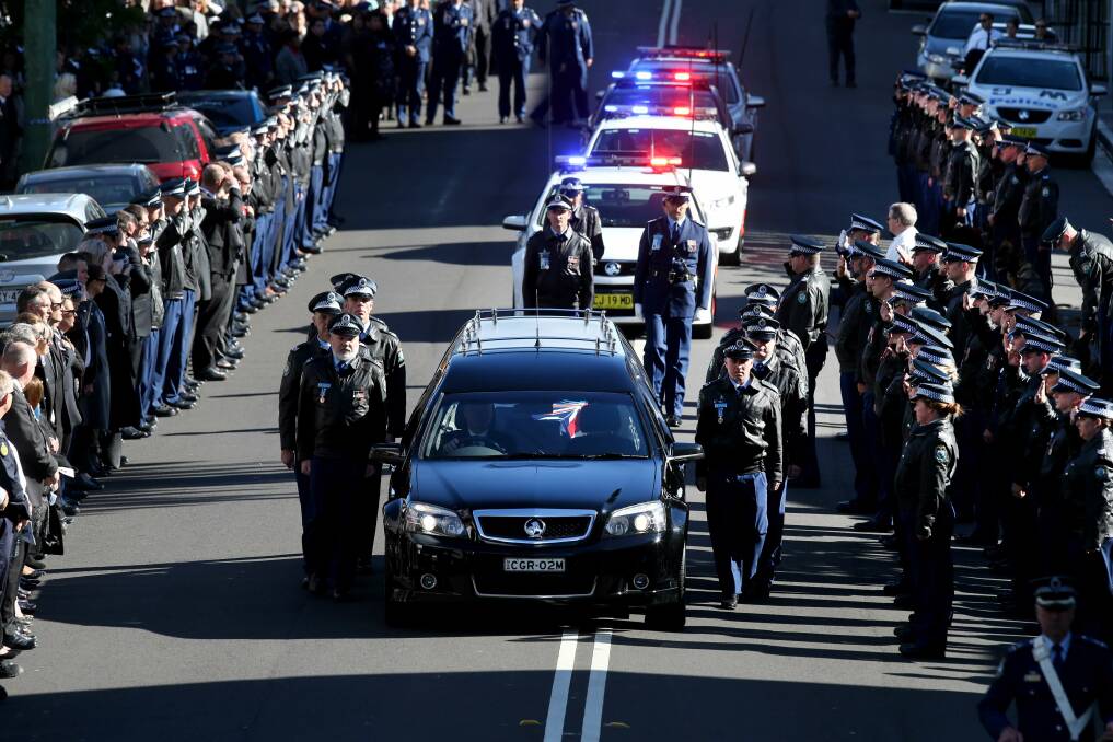The humble Wollongong general duties cop who eschewed promotion for 22 years was given a full police funeral.