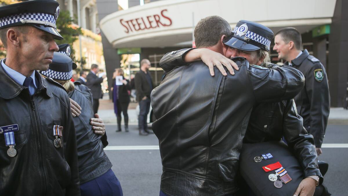 Police march in streets for beloved Wollongong cop Robert Sasagi
