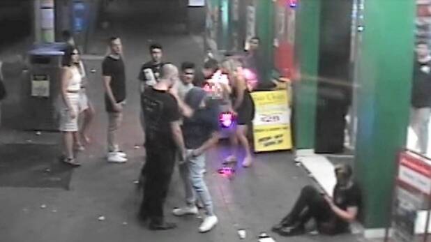 Police are hoping to identify a man who 'coward-punched' another man on New Year's Day in Civic. Photo: Screengrab