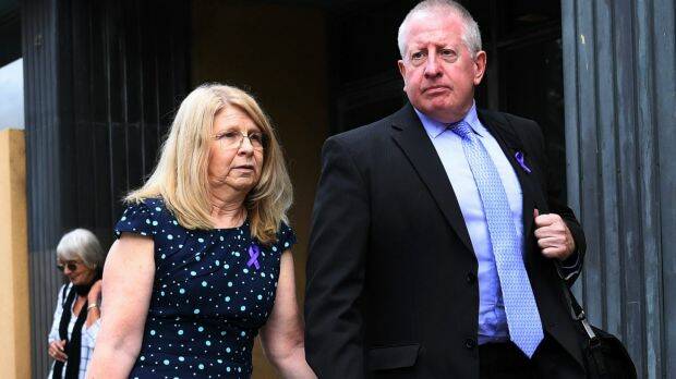 Faye and Mark Leveson, walk hand in hand as they leave the last day of the Coronial Inquest into the death of their son Matthew Leveson on Tuesday.  Photo: AAP
