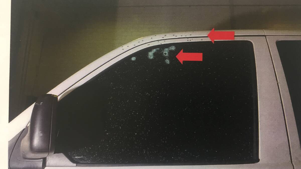 Forensic photographs tendered to the court show the damage to Mr Romaniszyn's car. 