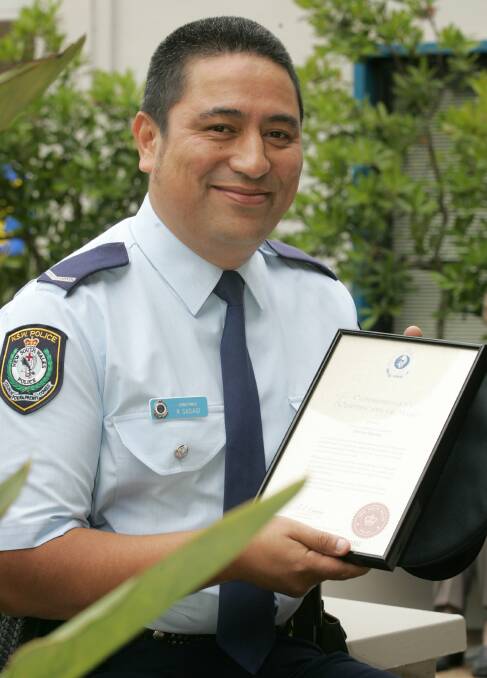 Constable Robert Sasagi was presented with a bravery award in 2005 after he disarmed a woman with a knife who had just stabbed someone on a train.