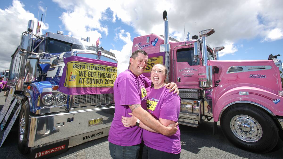 True Ross and Jason Sawrey at the Illawarra Convoy Free Family Fun Day on Sunday. Mr Sawrey proposed on the morning of the convoy. Picture: Adam McLean