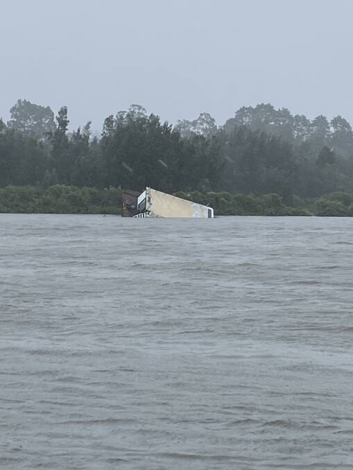 A sinking houseboat on the Clyde River at Nelligen. Photo: Stephanie Hunter