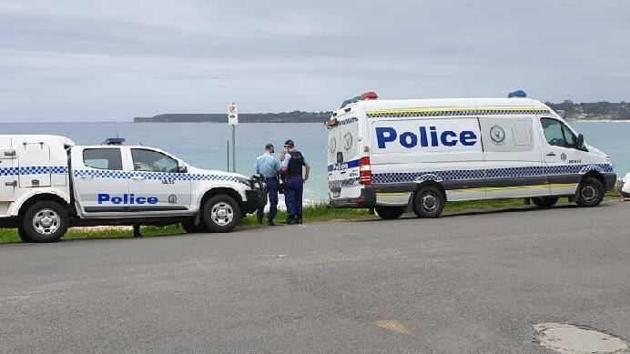 Police at the Mollymook beach where human remains were found on Friday. Image: TNV.