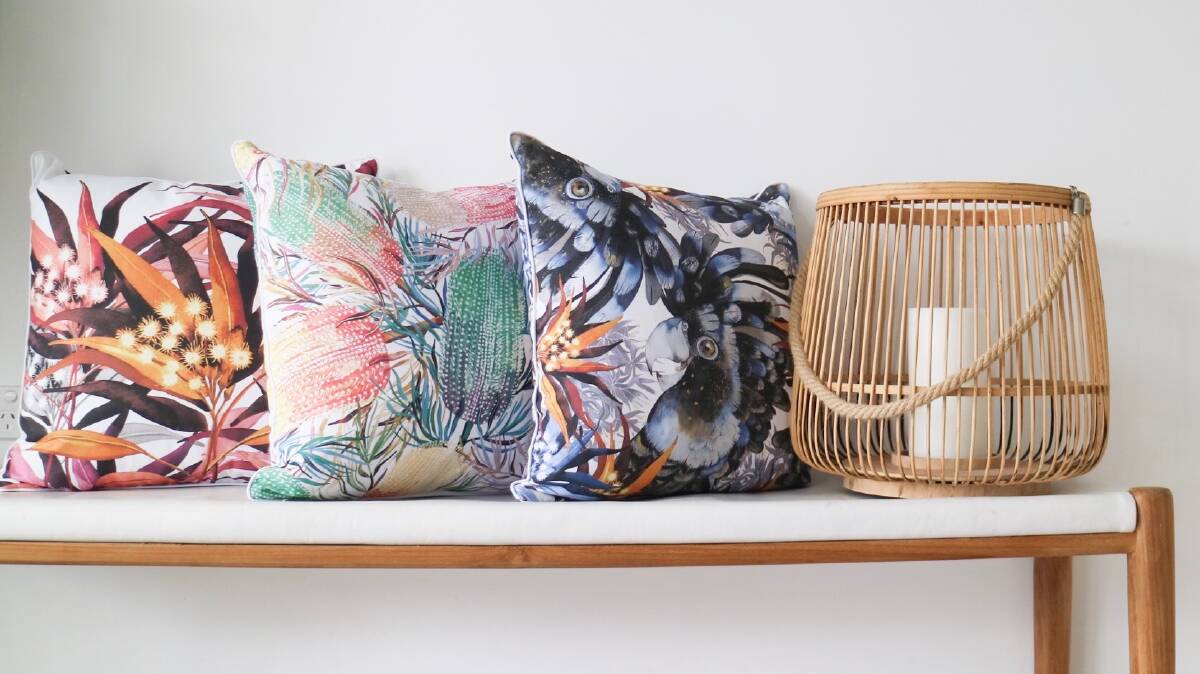Some of the cushions from Burgess's range of soft furnishings featuring her original ink and watercolour paintings.