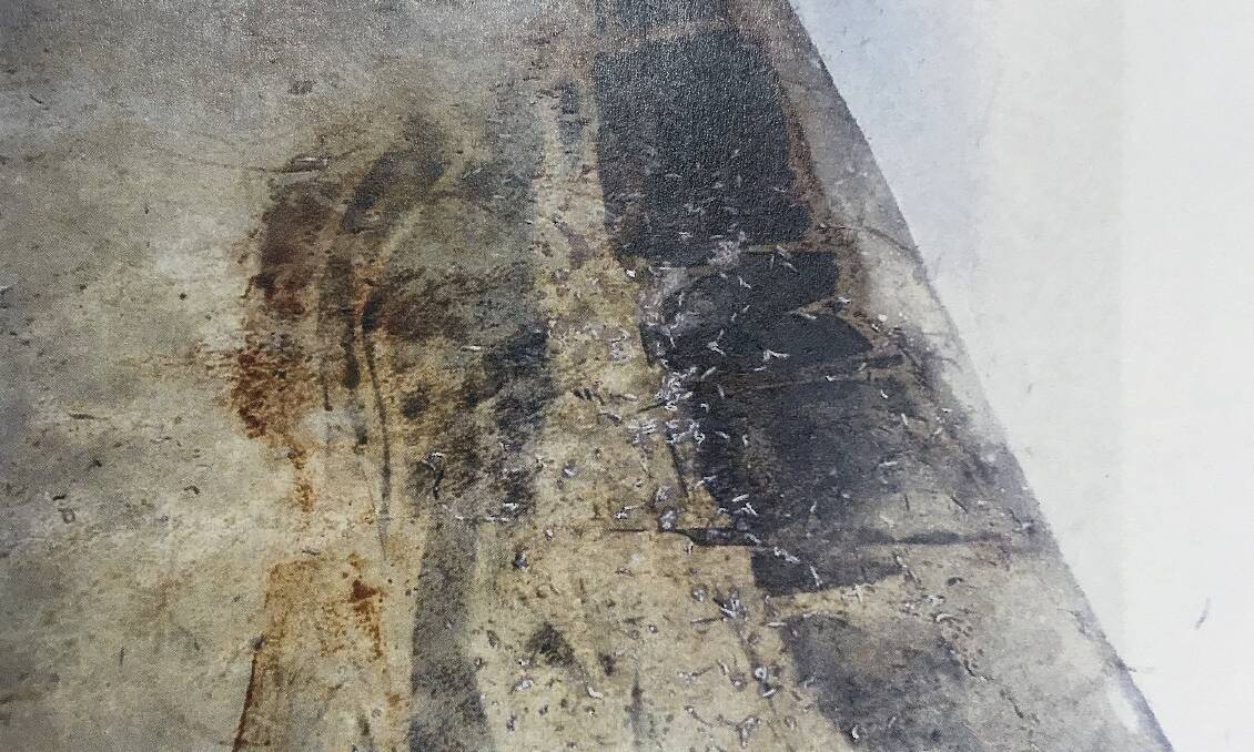The floor of the laundry where Mark Dower's body was found. Picture: AAP