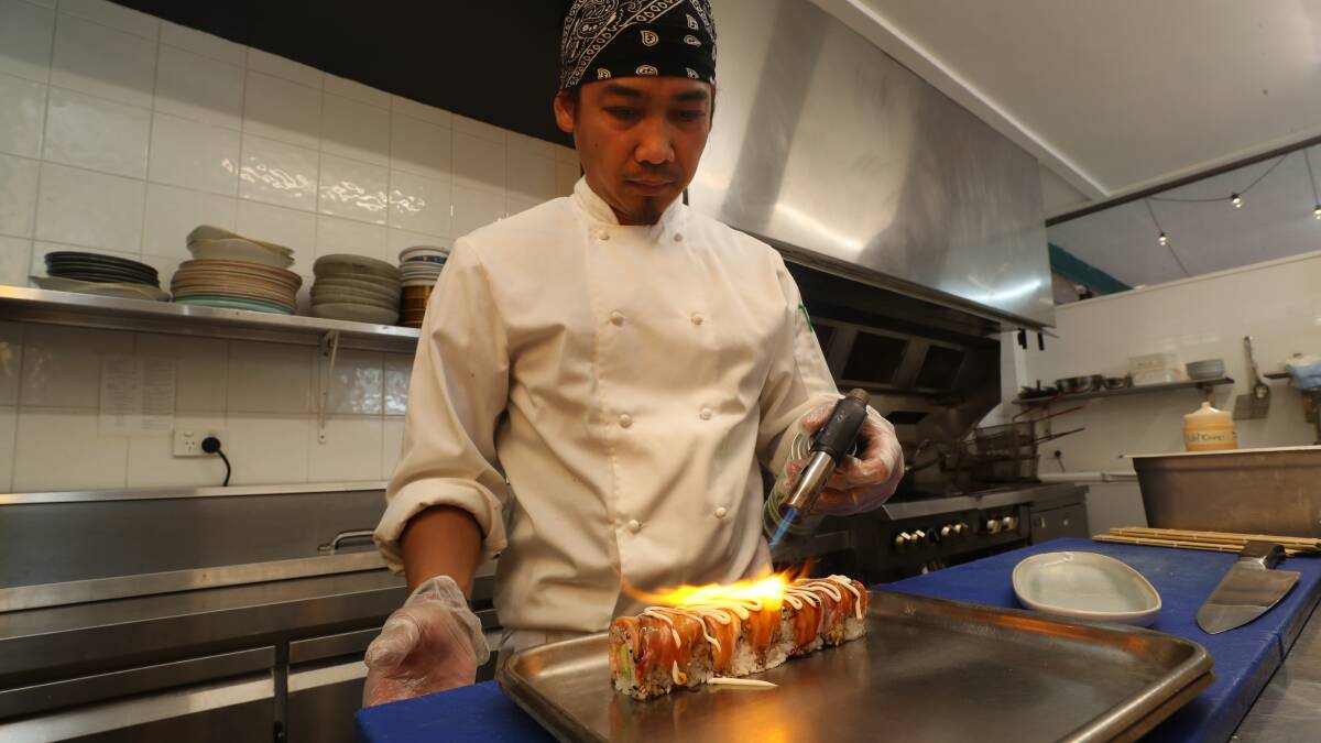 Head Chef Ridwan Jufri making Cactus Sushi's signature roll - the Volcano. 