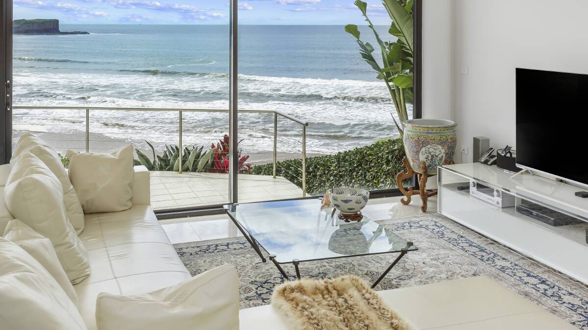 Inside the Kiama clifftop home with private access to beach