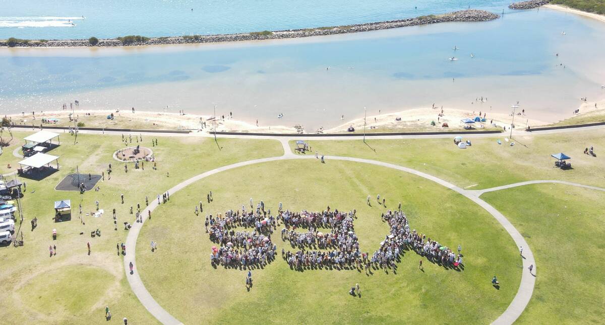 The Yes voters form a human billboard at Lake Illawarra. Drone footage by James Patrick Photography