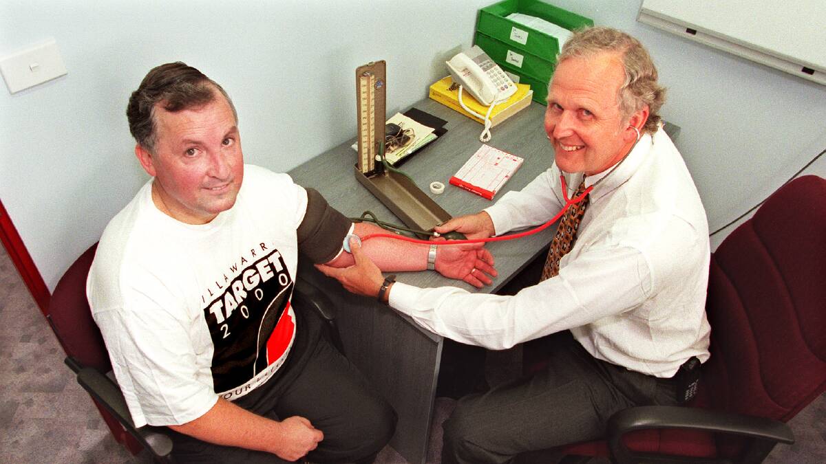 Dr Yarrow with a patient in 2000.