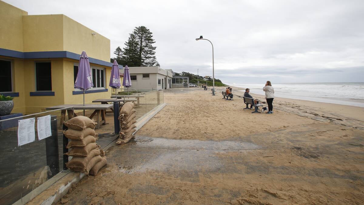 Surf inundated Thirroul promenade in May after a complex low pressure system hit the coast.