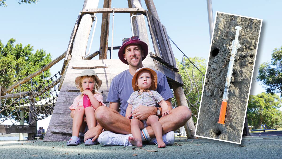 Dean Zorn with his kids Remy, 3, and Della, 1, at Lakeside Reserve and right one of the needles found on the beach. Pictures by Sylvia Liber and Nadine Morton