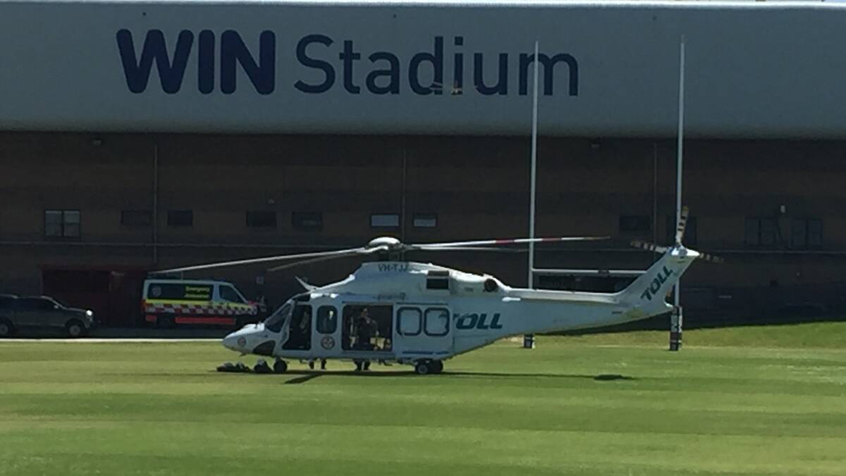An ambulance helicopter has landed at WIN Stadium. Picture: Robert Peet
