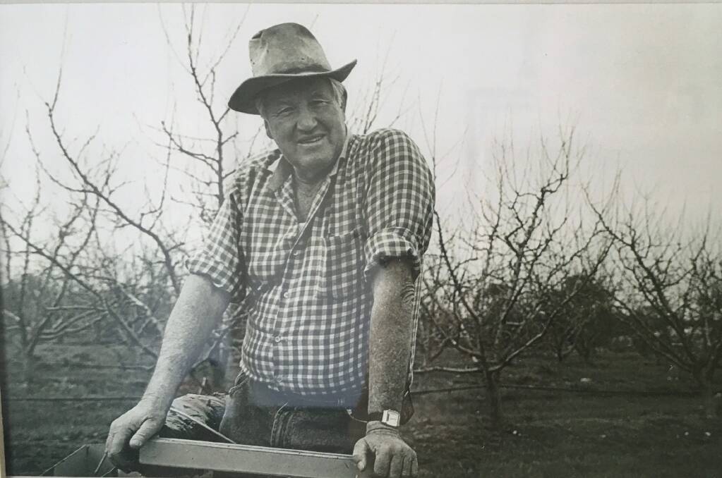 FINAL GIFT: Brian Jenkins, pictured in his orchard in 2002, is one of the thousands of generous Australians who have left a gift to a charity in their Wills. His bequest to The Alfred Hospital allowed his family to create a life-changing cancer research fellowship in his name. Picture: Supplied