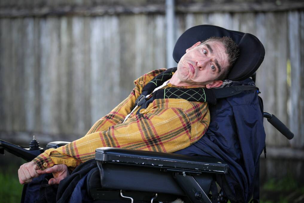 DISTRAUGHT: Berkeley man Jade Parkinson is in desperate need of a new commode seat and wheelchair - but the NDIS says no. Picture: Adam McLean. 