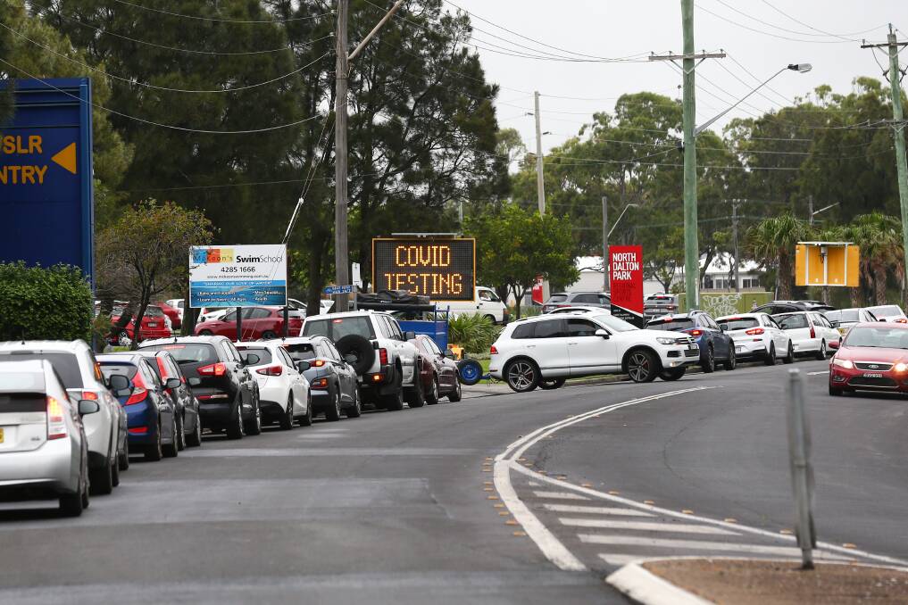 Cars line up at the COVID testing site at North Dalton Park in Wollongong on Thursday. Picture: Adam McLean.