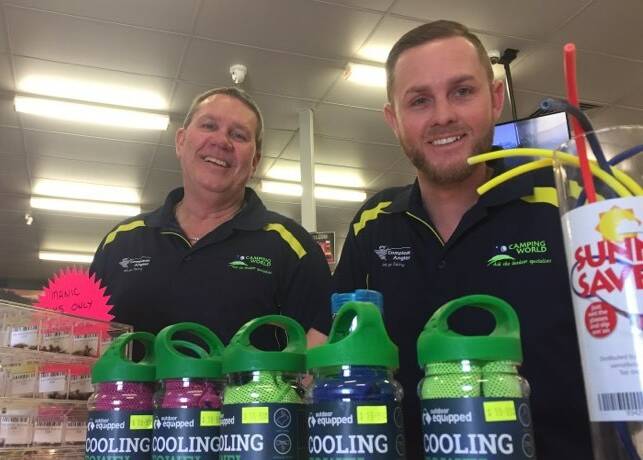 OVERWHELMED: Darren Flanagan, pictured in his Camping World store with son Steven, has been inundated with support after speaking out about the impact of bushfires on his business and an ensuing insurance battle.