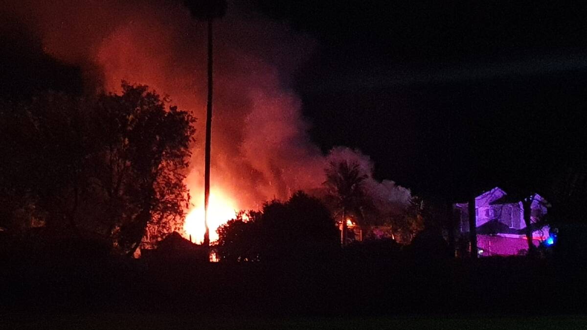 The Matthew Street home was well alight by 2.16am. Picture: Zoe Cartwright.