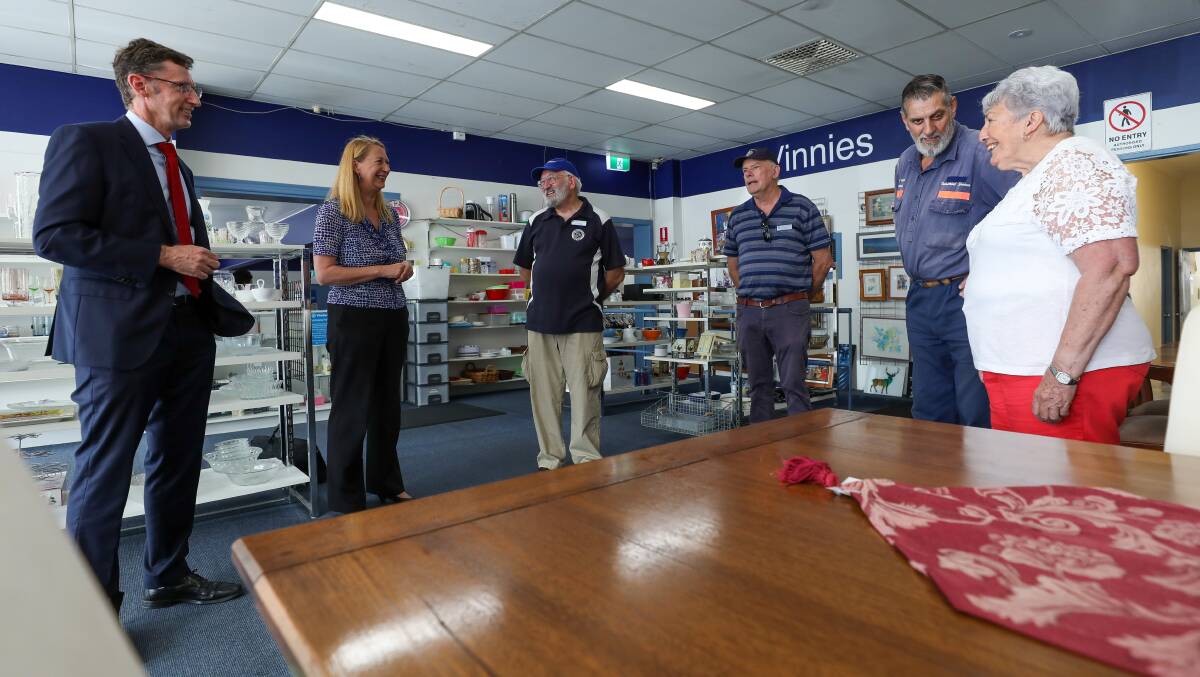 Labor federal MP's Stephen Jones and Sharon Bird meeting staff from the Vinnies store in Oak Flats, including Tom Gersbach on February 12. Photo: Adam McLean.