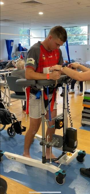 GRIT: Kiama 20-year-old, Tom Norris, learns to walk again after spinal inflammation left him suddenly paralysed. Image supplied.
