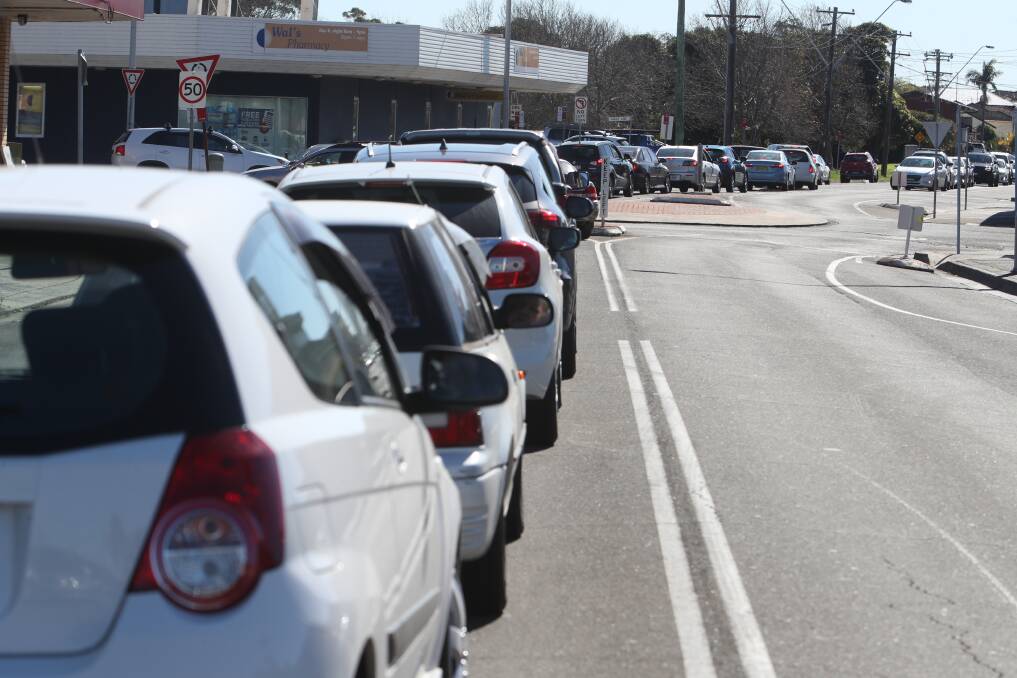 Patients were waiting for a COVID-19 test at the Warilla clinic in traffic that stretched along Brian Street and parts of George Street for more than two hours. Picture: Adam McLean.