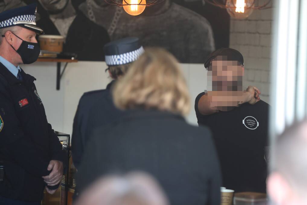 ARREST: Police attend Village Fix cafe.