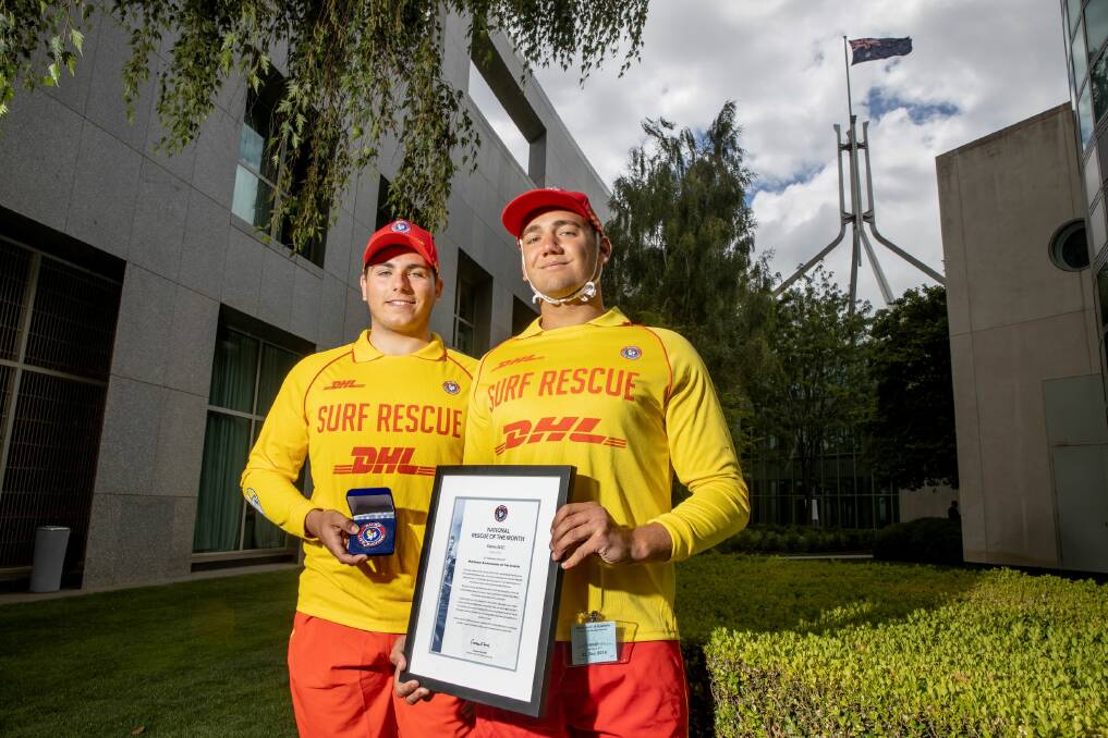 PROUD MOMENT: Bradley Dawson and Toby Streamer receive a National Rescue award at Parliament House on Monday, December 2. Absent: Rhys Dawson.