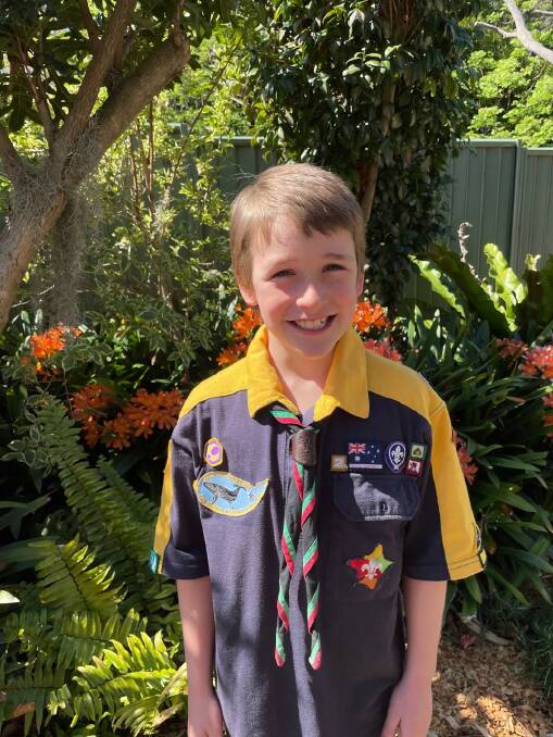 SUPER HAPPY: Jayden Savage was bouncing after he was named Cub Scout of the Year for his bush care efforts. Image supplied.