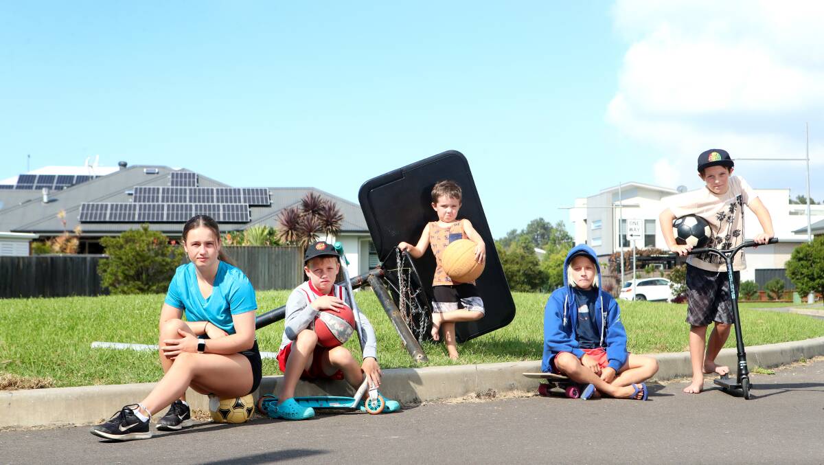 Thirroul kids had to remove a communal basketball hoop because council threatened on-the spot fines.The council has since reversed the decision. Picture: Sylvia Liber. 