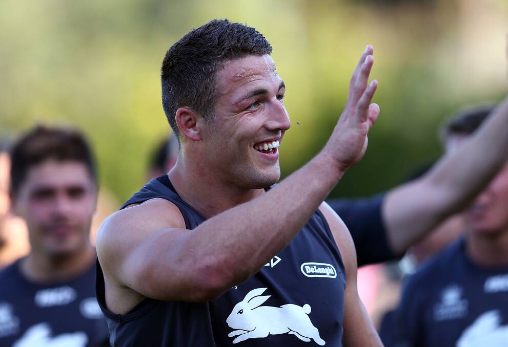 Sam Burgess waves to Rabbitohs fans at training. Picture: GETTY IMAGES