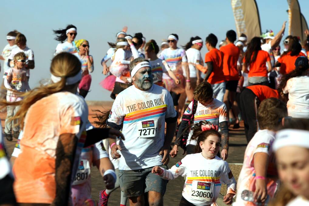 More than 10,000 people took part in the region's first Color Run run on a chilly Sunday morning.Picture: SYLVIA LIBER