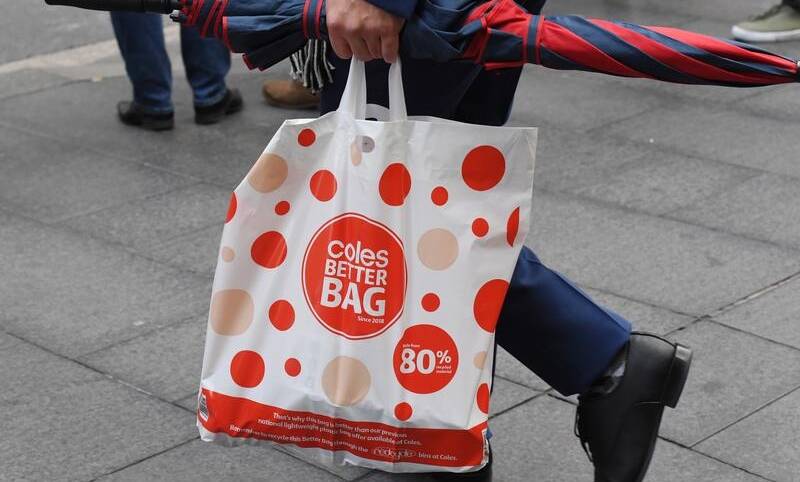 Coles has decided to continue giving away reusable plastic bags.