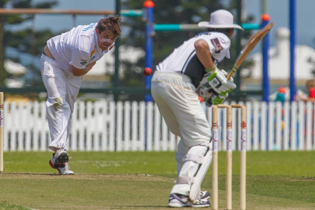 Helensburgh's Christian Lewis sends down a delivery against Port Kembla on day one at King George Oval. Port were dismissed for 176, with Helensburgh to resume at 1-57. Picture: CHRISTOPHER CHAN
