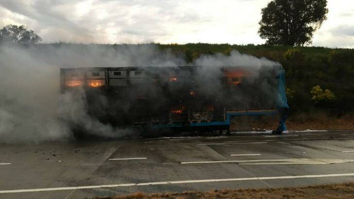 The postal truck on fire at Woomargama on Friday morning Photo: Live Traffic NSW