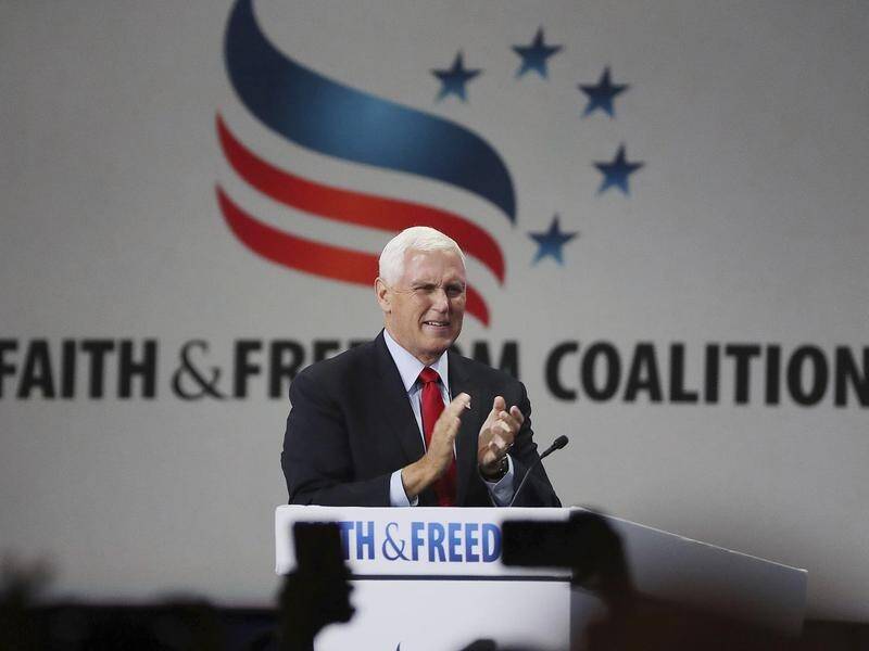Former US vice president Mike Pence has been heckled and booed at a conference in Florida.