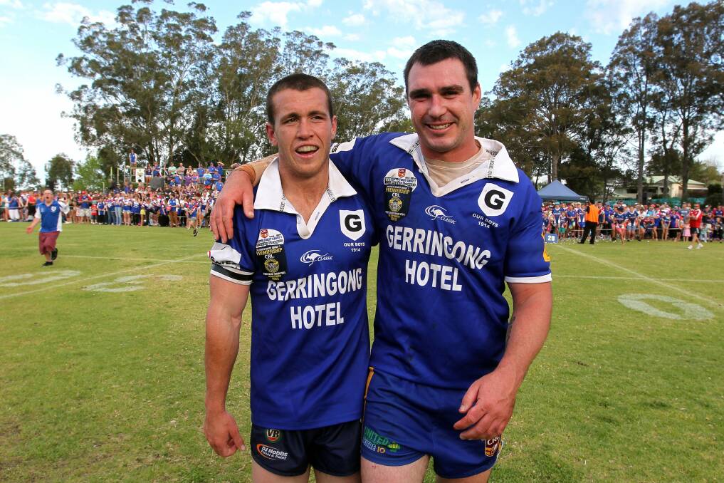 Lions Rixon Russell and Ryan Staples after winning the Group Seven grand final last year. Picture: SYLVIA LIBER