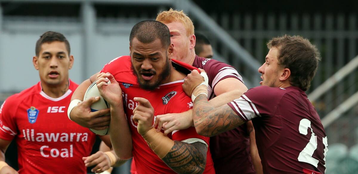 Try scorer Leeson Ah Mau takes on the Manly defence on Saturday at WIN Stadium. Picture: ROBERT PEET