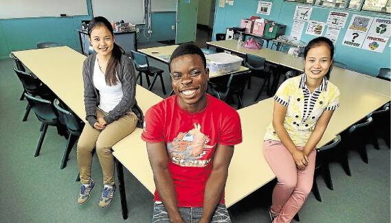  Bu Meh, 24, Maurice Aloegninou, 21, and Plae Meh, 22, will each receive a scholarship to help cover fees and other costs for their education. Picture: KIRK GILMOUR
