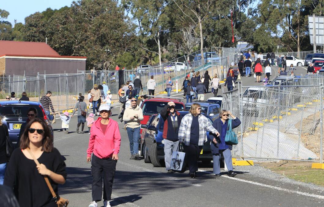 The Foragers Market opened under clear skies at Bulli Showground, bringing about 6000 people and some complaints about overcrowding and parking difficulties. Picture: ANDY ZAKELI