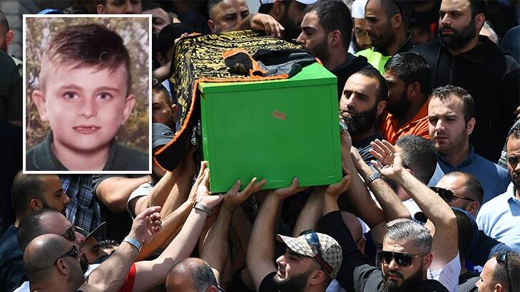The coffin of schoolboy Jihad Darwiche being carried out of the funeral service at Lakemba Mosque. Photo: David Moir