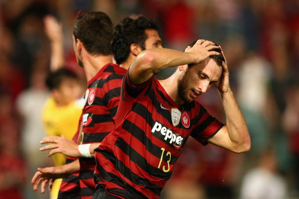 Wanderers centre back Matthew Spiranovic reacts after a missed shot at goal during Wednesday's loss to Guangzhou Evergrande at Pirtek Stadium. Picture: GETTY IMAGES