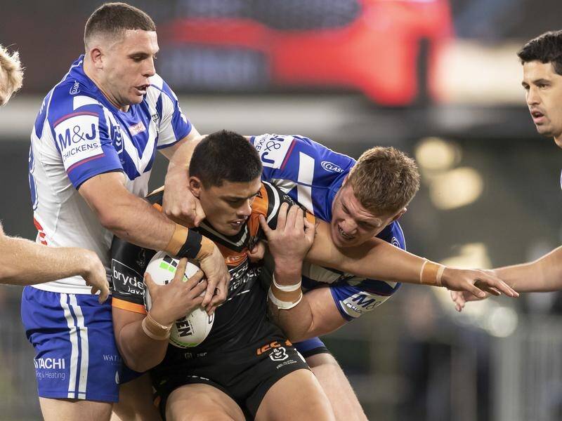 Tommy Talau (pic) has scored a double in the Wests Tigers' 34-6 NRL win over Canterbury.