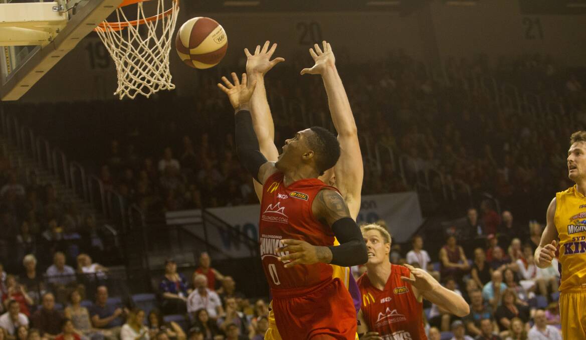Hawks' top scorer Jahii Carson goes to the basket against the Sydney Kings. Picture: CHRIS CHAN